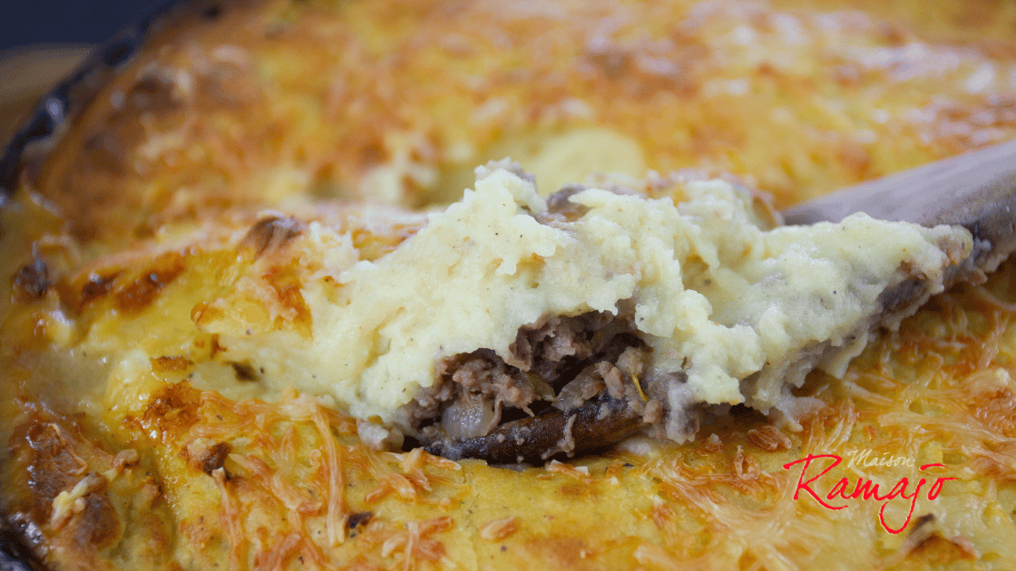 Duck confit shepherd's pie baked in a gratin dish